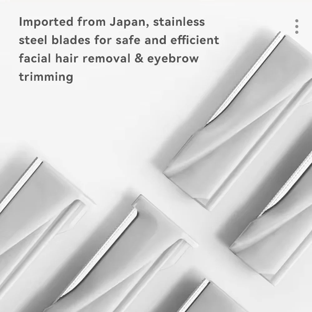 Multiple blade head options for dermaplaning tool including facial and eyebrow grooming attachments