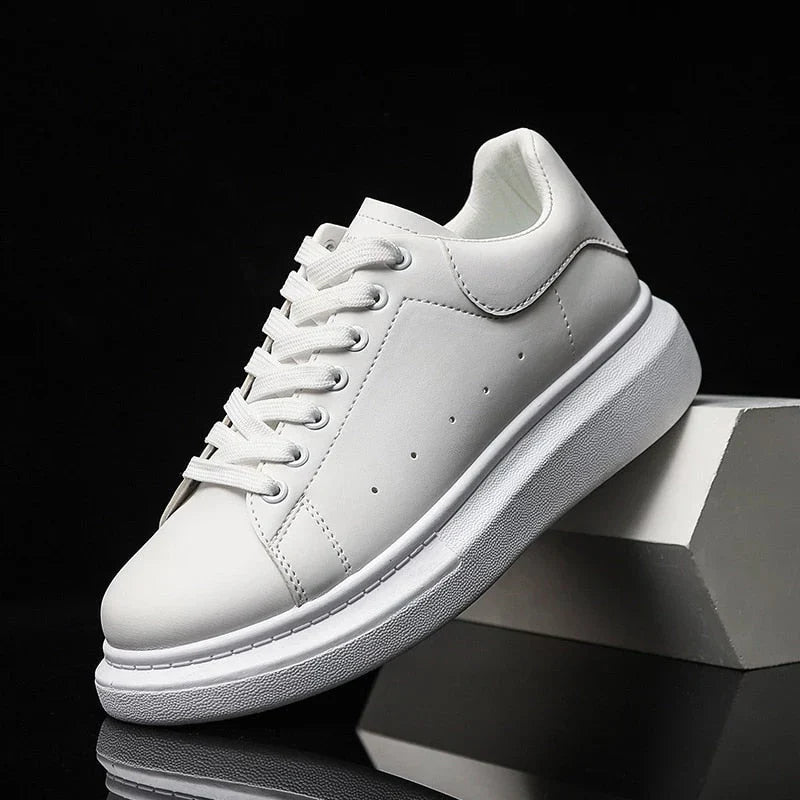 Men's lace-up chunky sole trainers displaying bold silhouette and elevated platform design