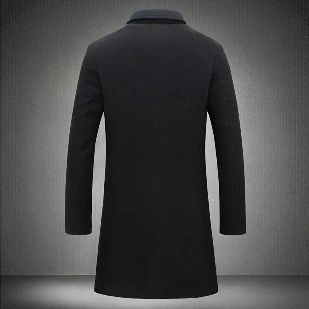 Side profile of men's knee-length overcoat displaying relaxed fit and tailored silhouette