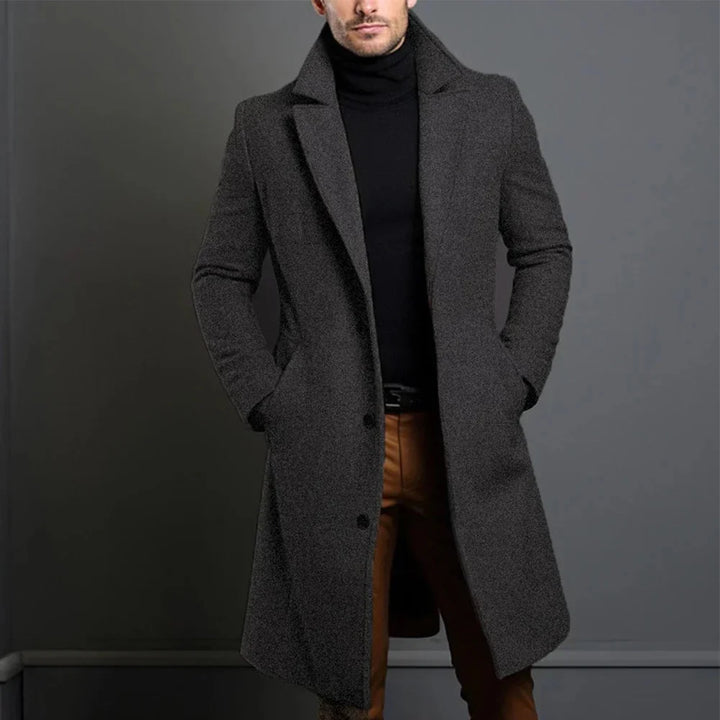 Men's long overcoat in camel showing button-front closure and notched lapel construction