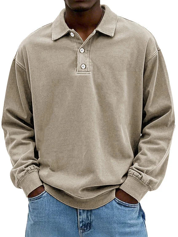 Side view showing relaxed fit silhouette of men's long sleeve polo shirt