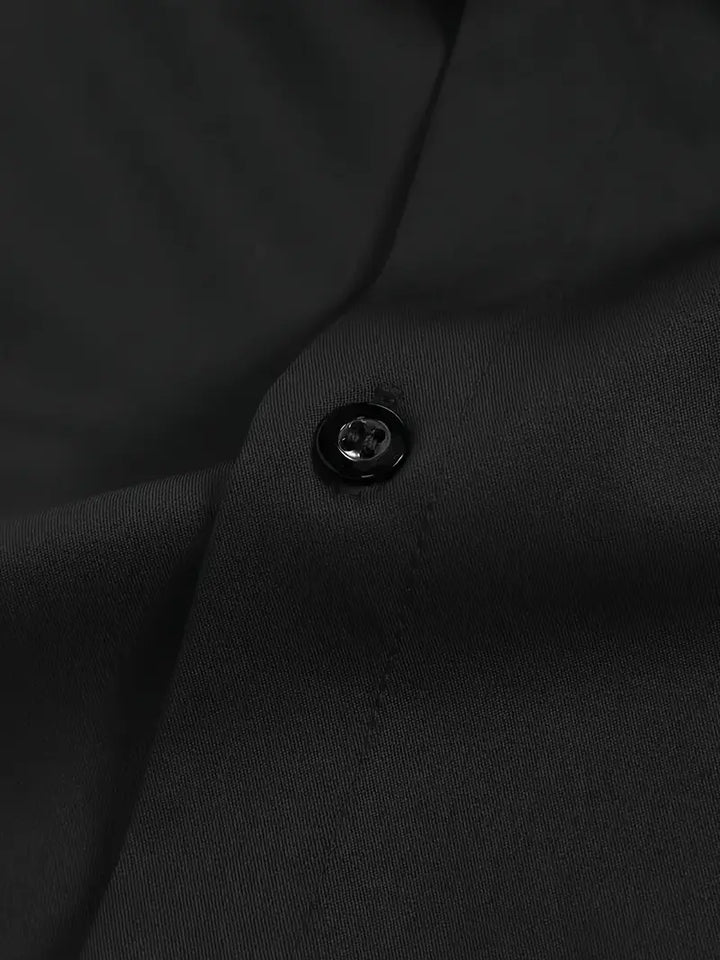 Detail of men's shirt collar and button-front closure in crease-resistant fabric