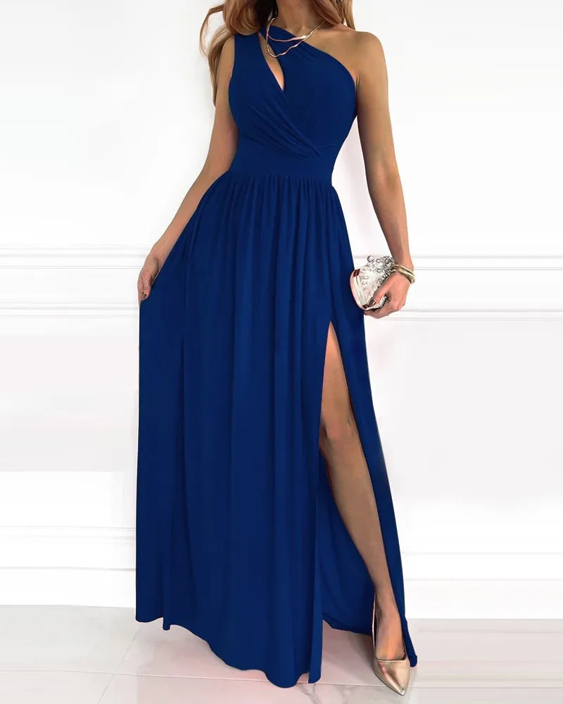 Side angle of halter neck maxi dress displaying wrapped bodice detail and thigh-high slit opening