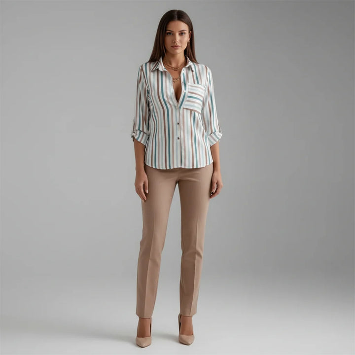 Front view of women's graphic print blouse with button-through front and collar