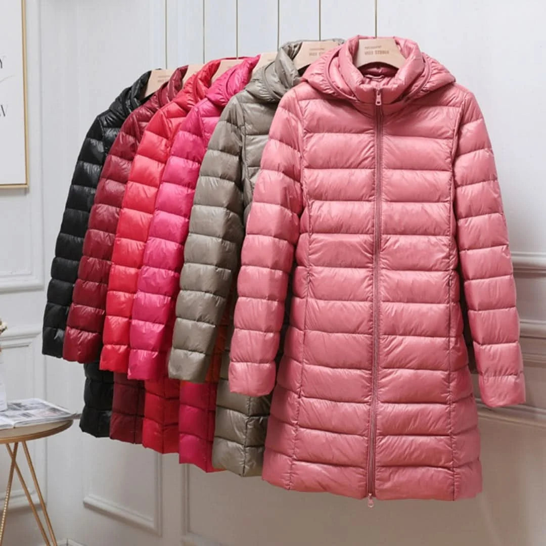 Women's quilted puffer coat with detachable hood shown in multiple colours including pink, red, taupe, and black on hangers