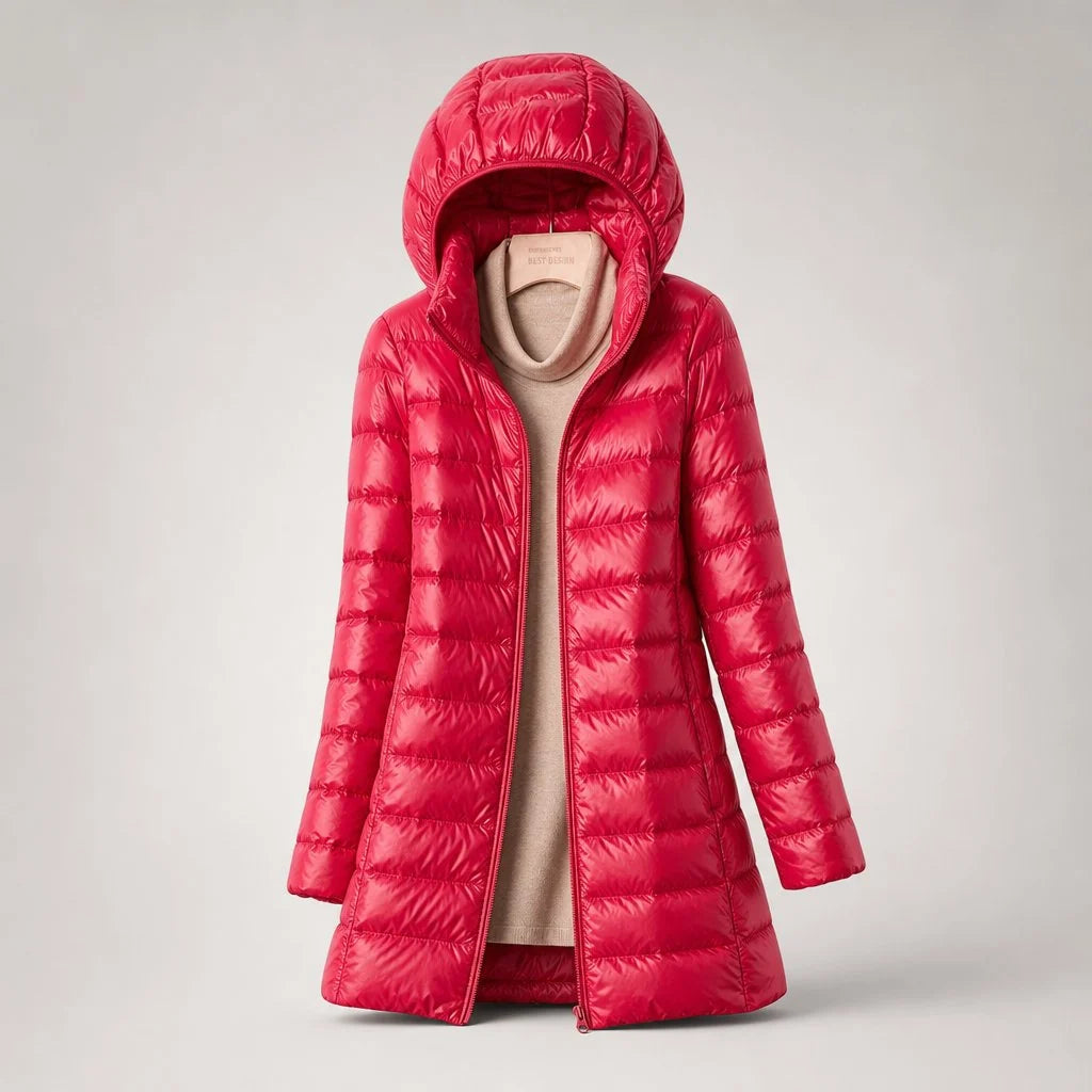 Detail view of women's puffer coat hood attachment and adjustable drawstring feature