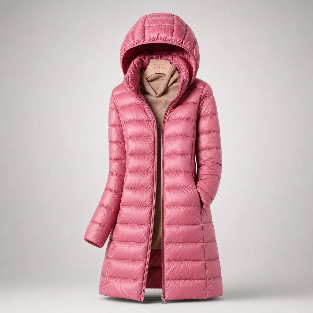 Close-up of women's puffer coat zip closure and quilted construction detail