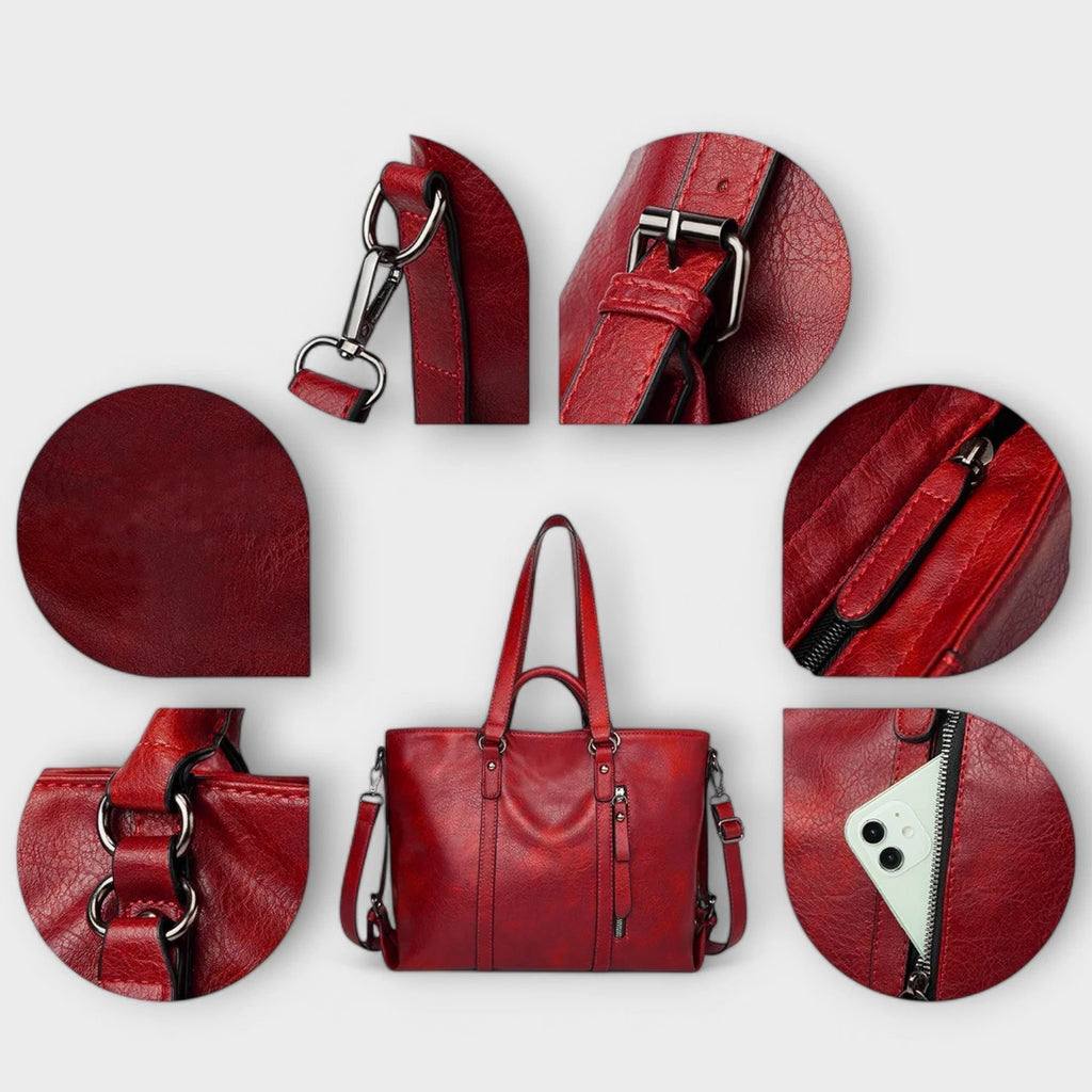 Close-up of tote bag handles with metal hardware and contrast stitching