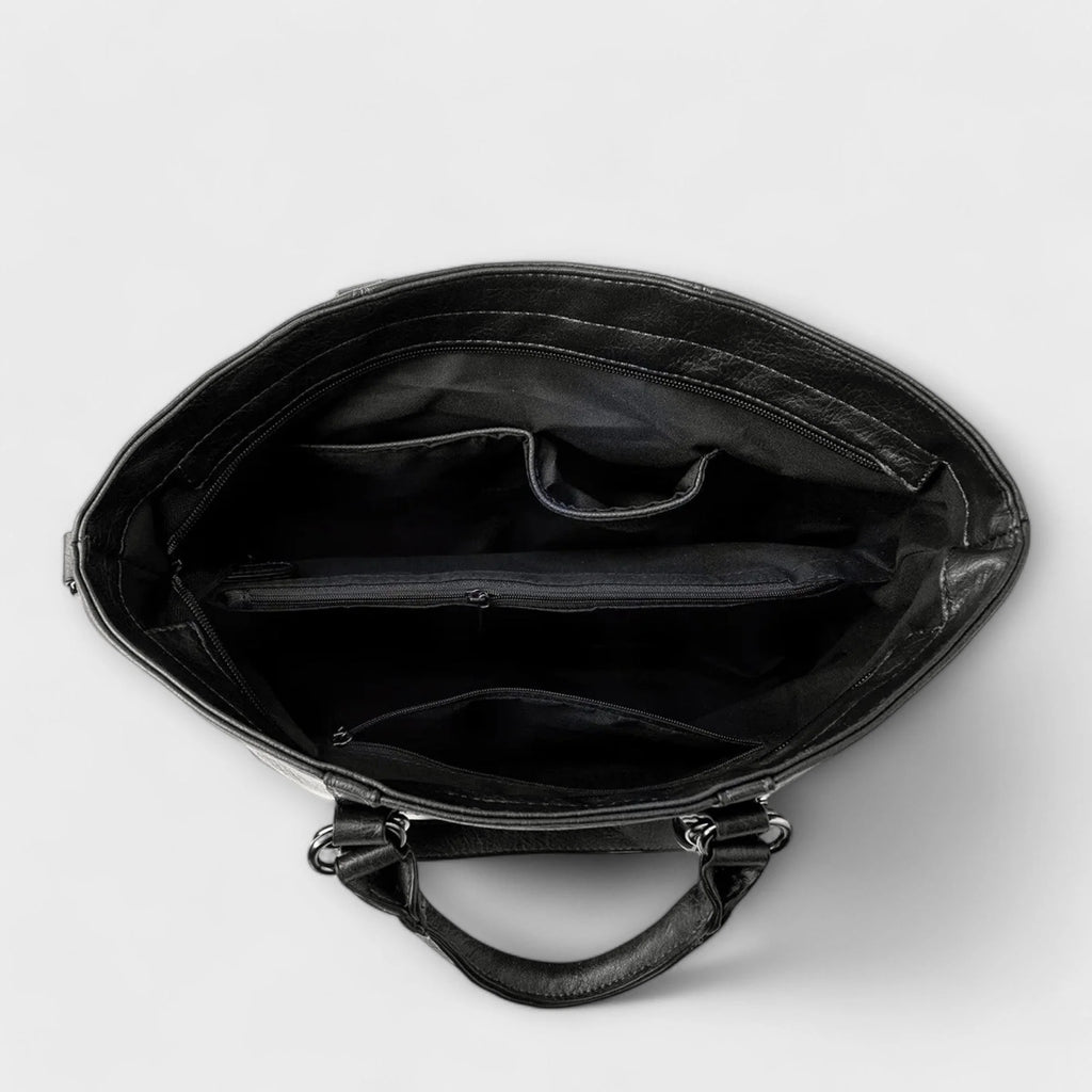 Back view of women's structured tote bag with adjustable shoulder strap