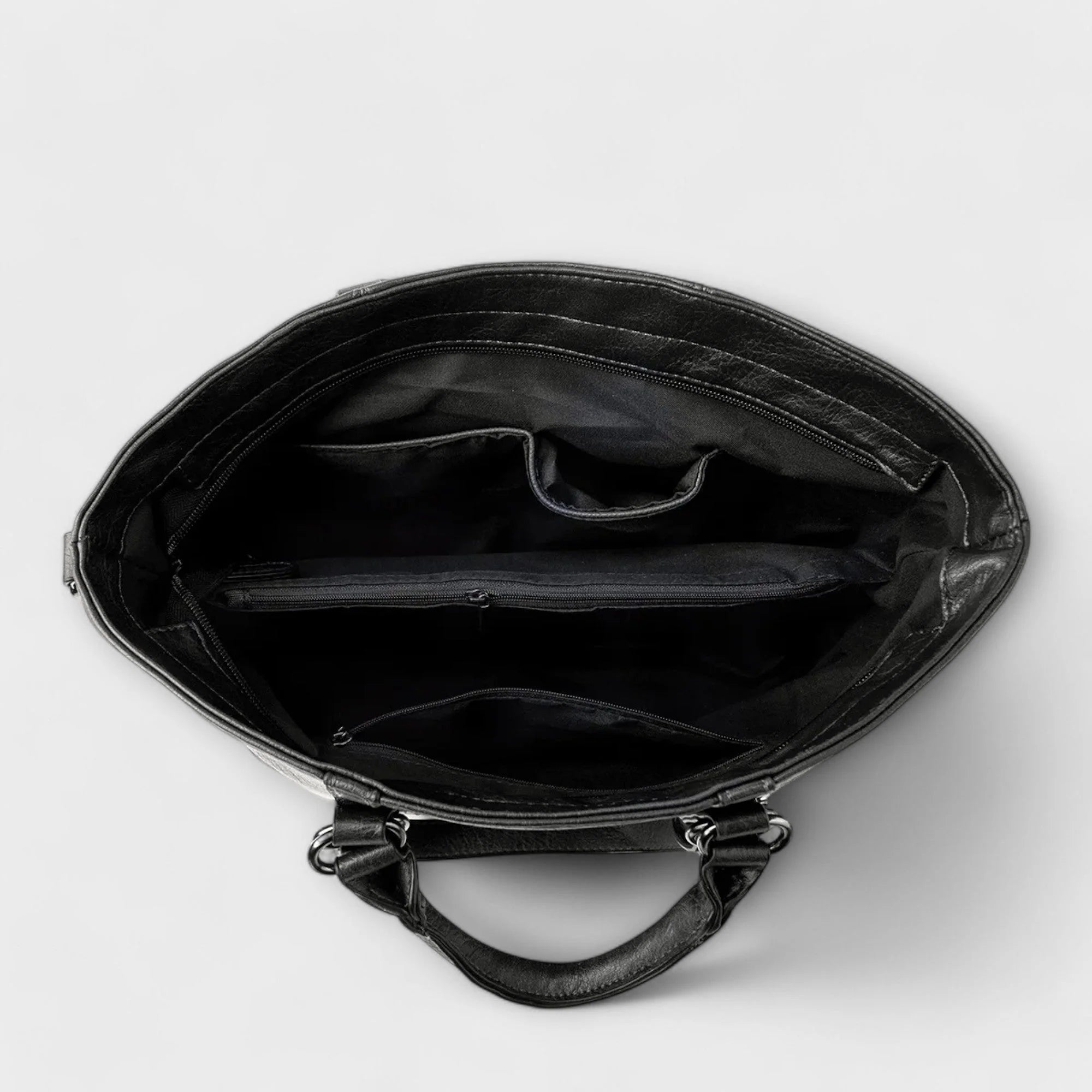 Back view of women's structured tote bag with adjustable shoulder strap