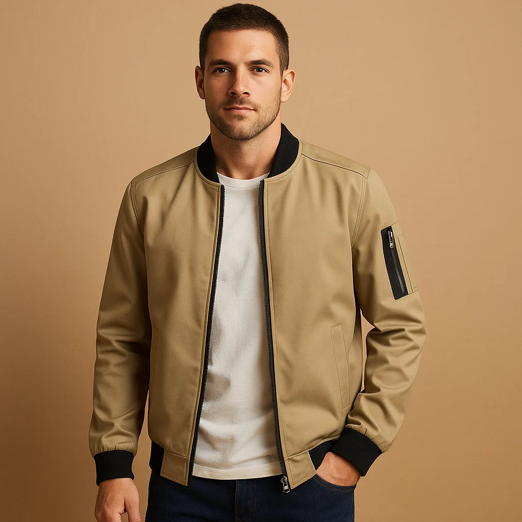 Men's bomber jacket styled with casual trousers showing relaxed fit and structured silhouette