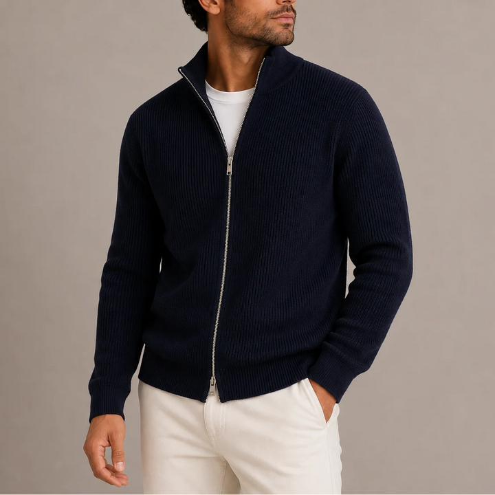 Men's ribbed cardigan worn with light trousers showing versatile smart-casual styling option