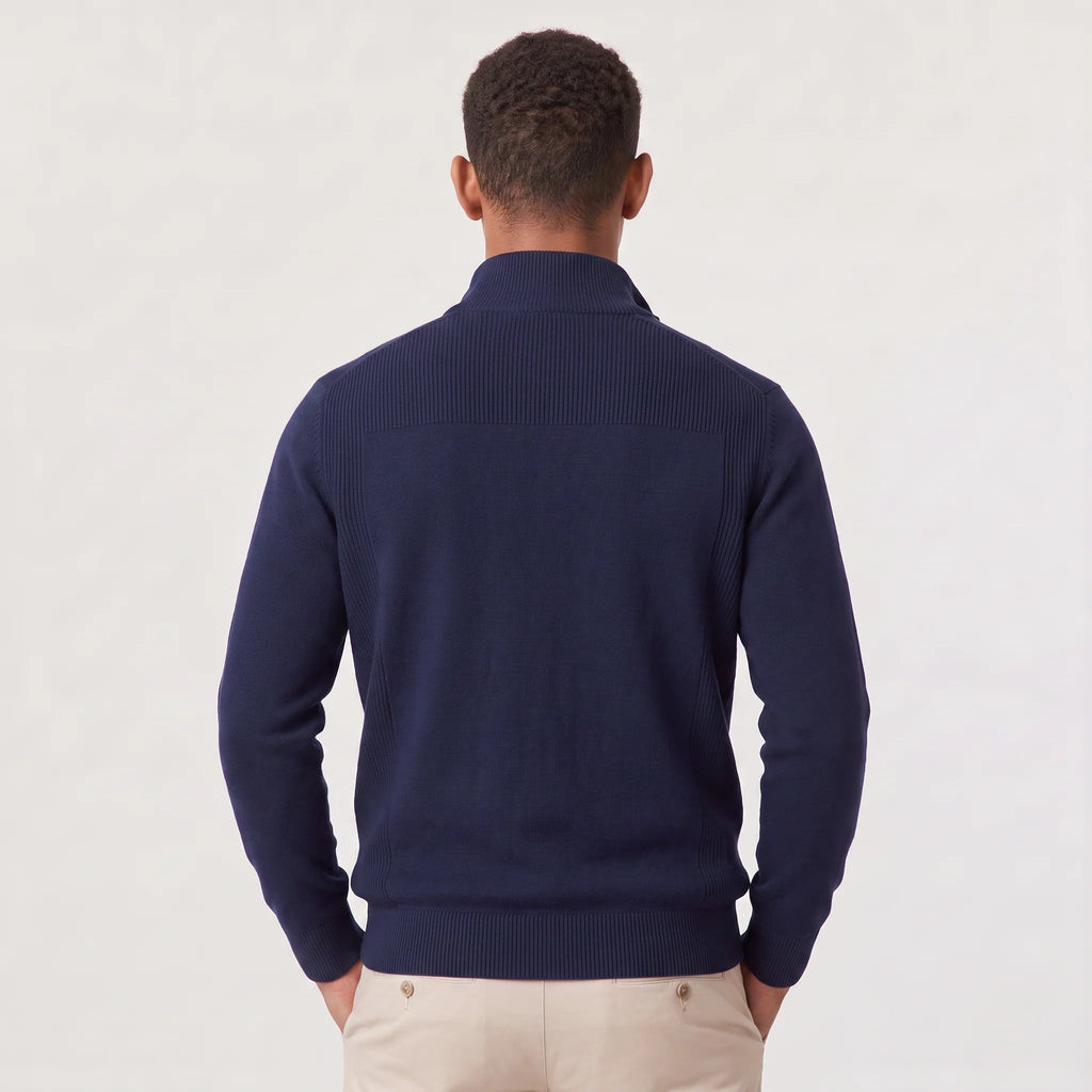 Close-up view of men's quarter-zip knit jumper showing stand collar and contrast zip detailing