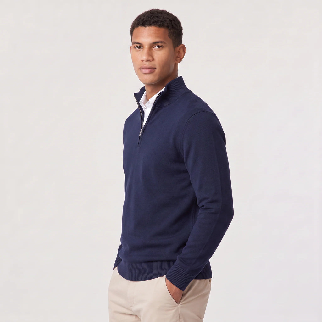 Side view of men's navy quarter-zip knit jumper showing regular fit and ribbed hem