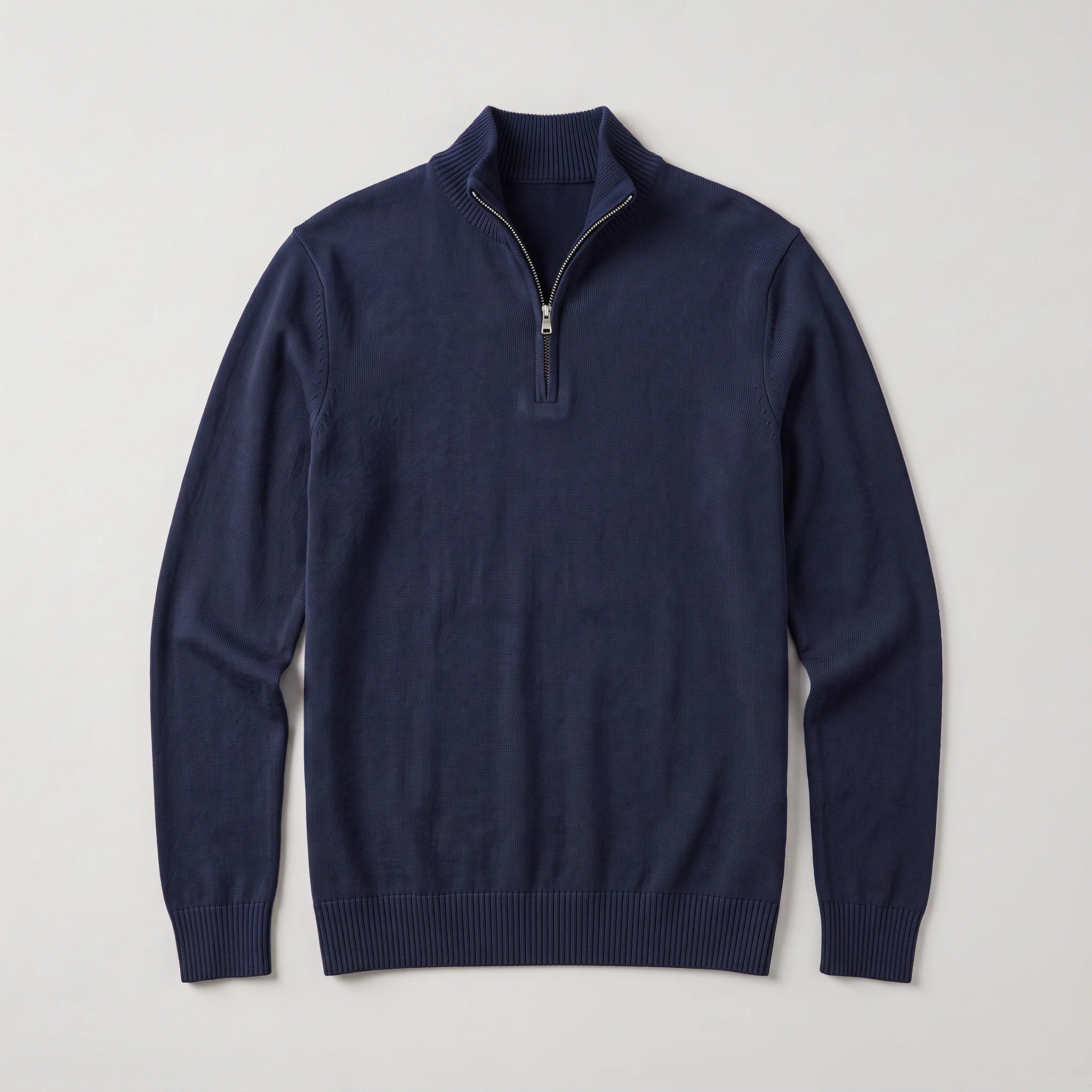 Men's quarter-zip knit jumper in burgundy displaying smooth knit finish and ribbed cuffs