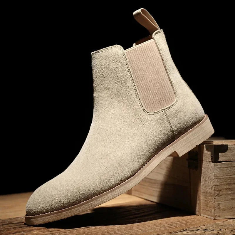 Rear view of men's Chelsea boots highlighting pull tab at heel