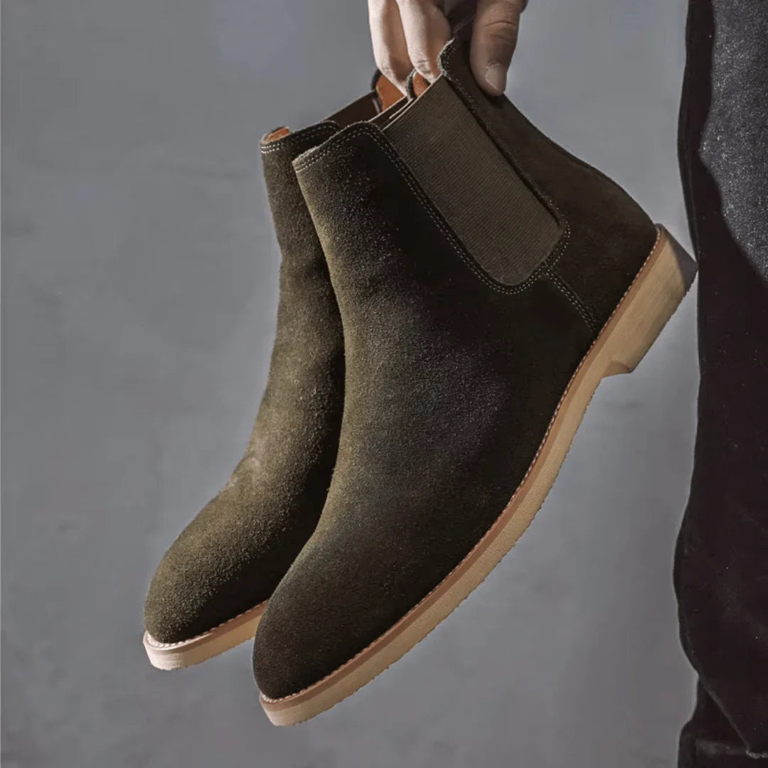 Detail shot of men's Chelsea boots sole unit and construction quality