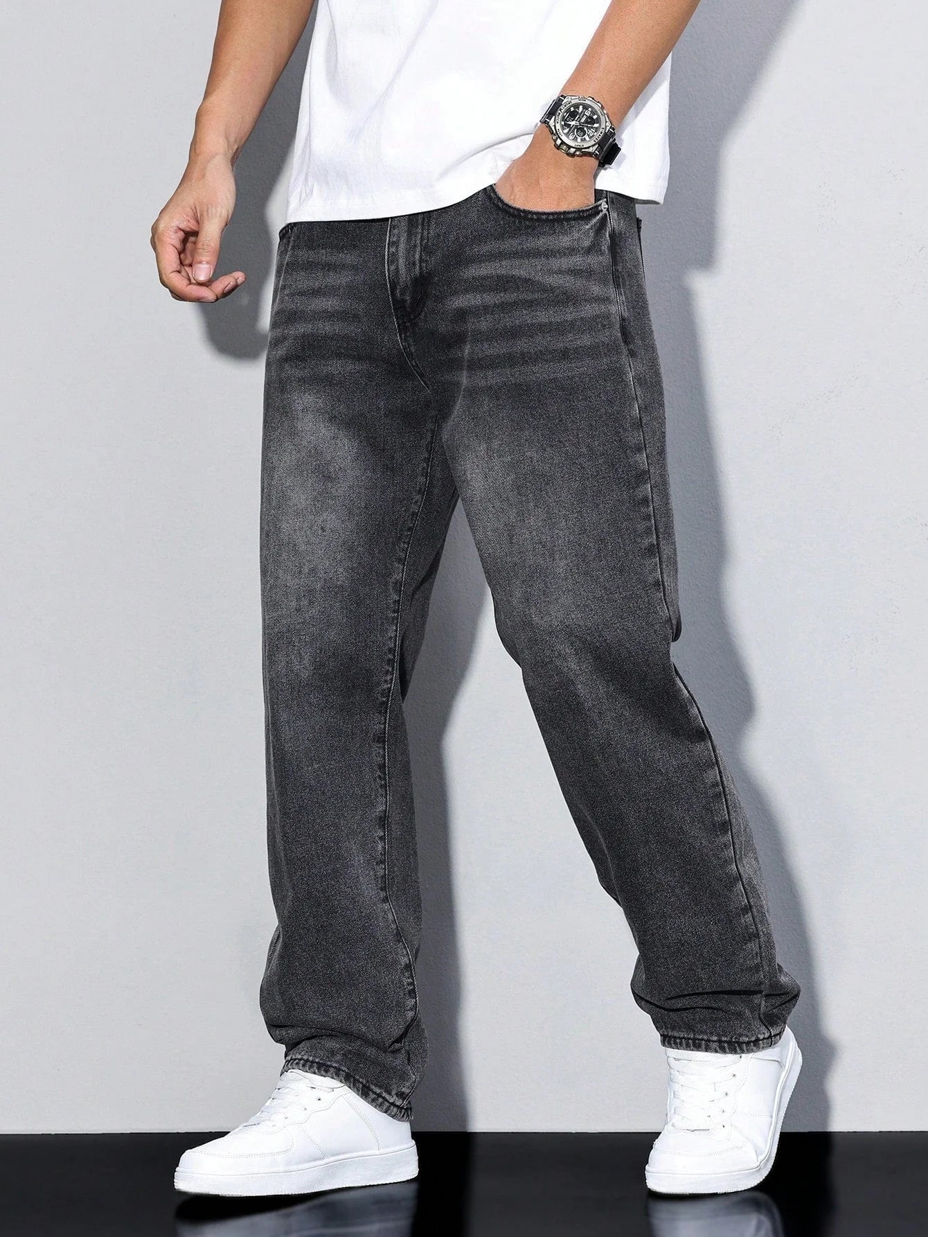 Men's straight leg jeans in washed grey denim with relaxed fit and classic five-pocket styling