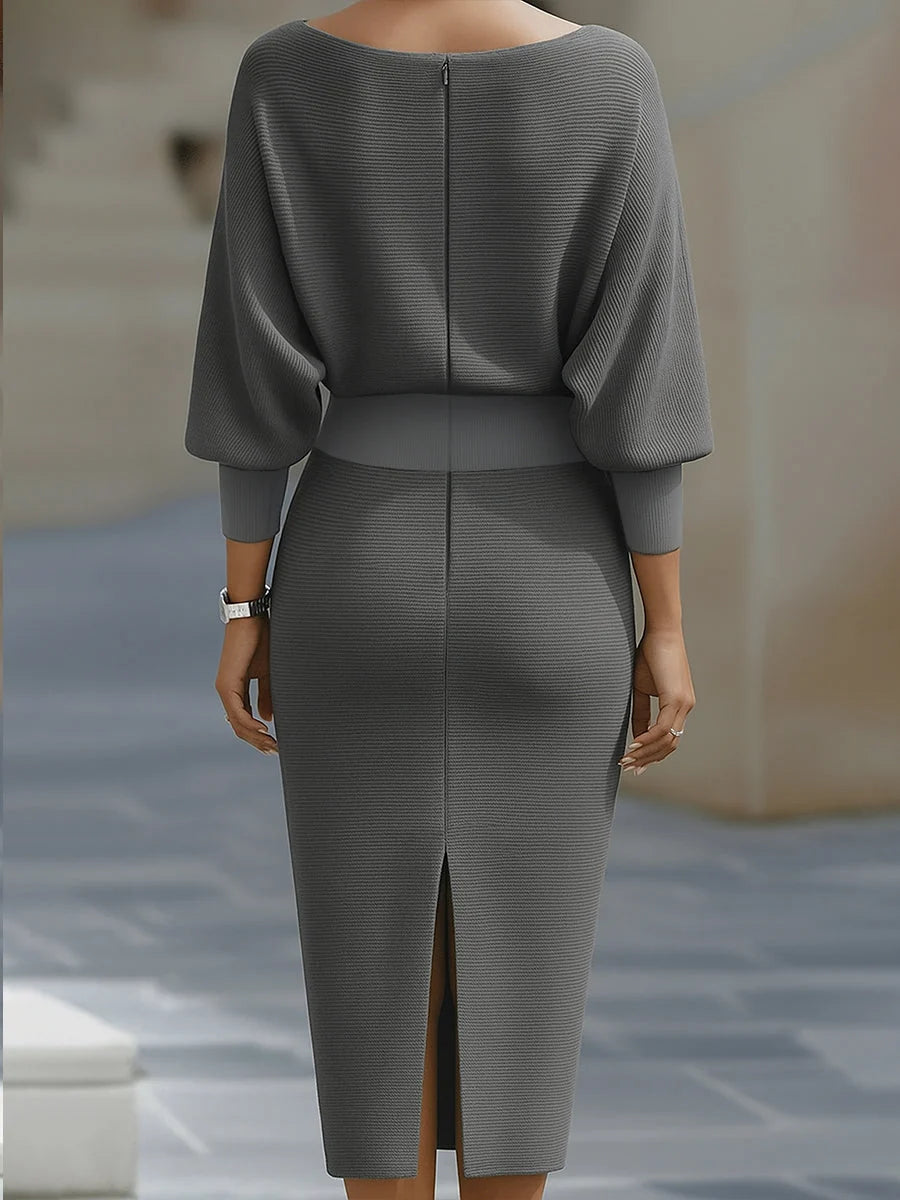 Cowl neck midi dress with batwing sleeves and fitted skirt shown from front angle