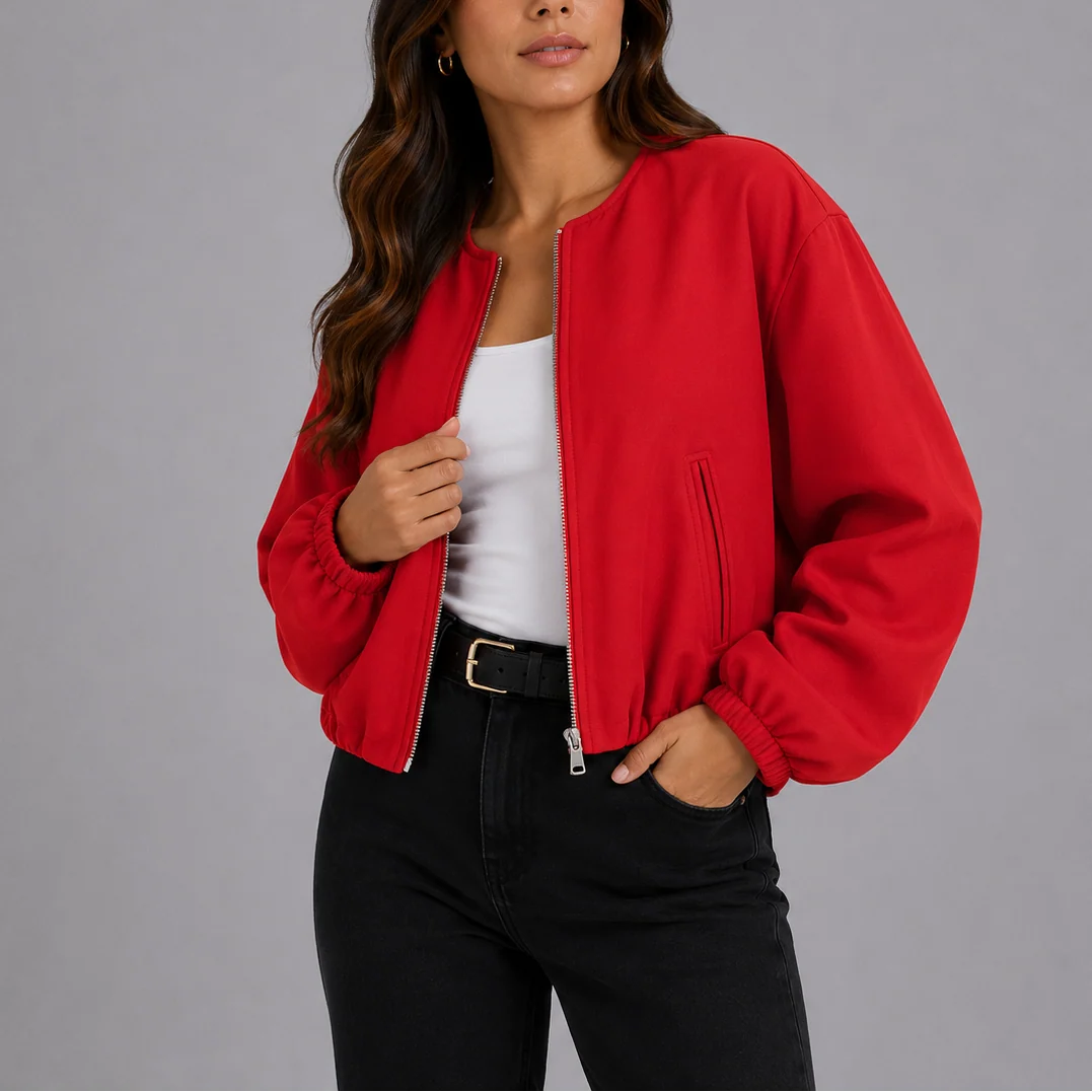 Rear view of women's bomber jacket showing relaxed silhouette and elasticated waist hem finish