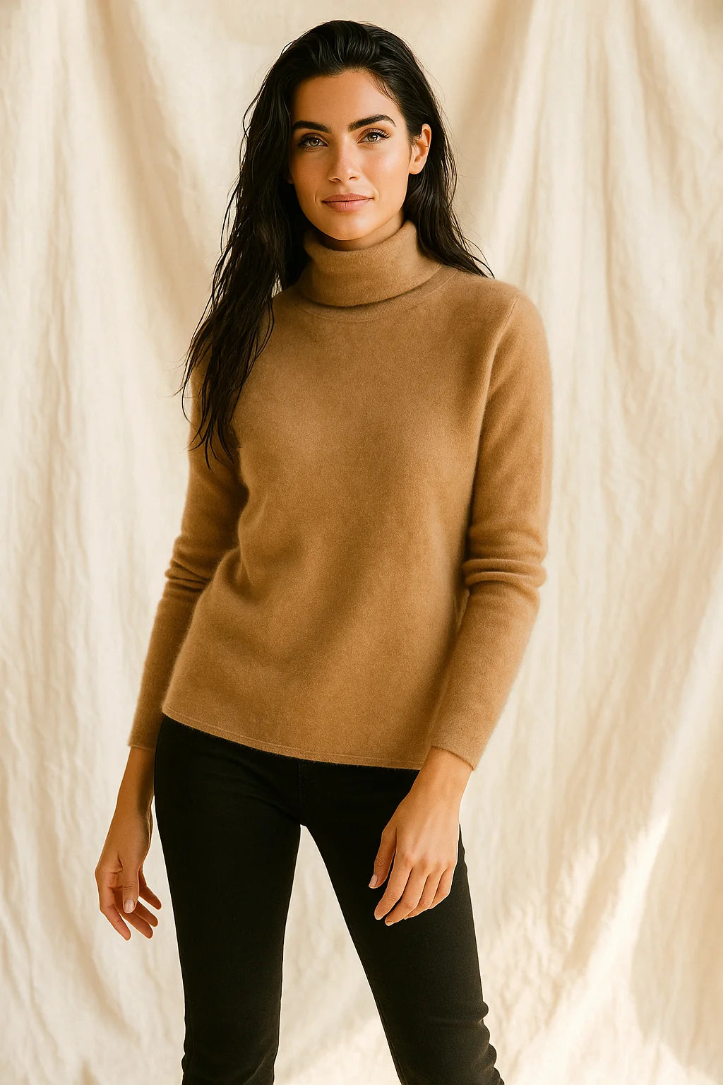 Woman wearing a cashmere turtleneck jumper with a roll neck, styled for casual day wear