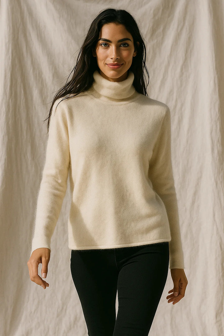 Back view of a cashmere turtleneck jumper showing the relaxed fit and structured ribbed hem