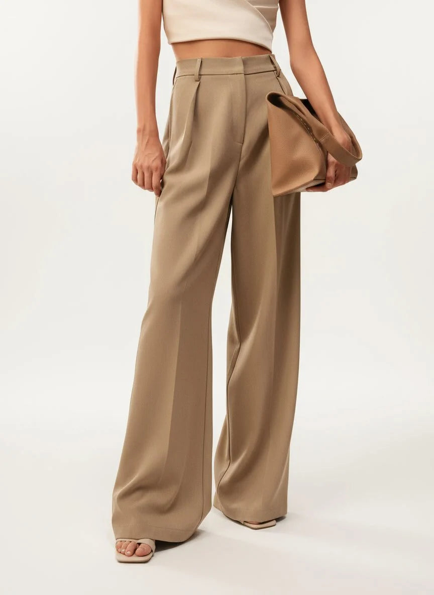 Women's high waist trousers in camel with wide leg cut and structured drape from hip to ankle