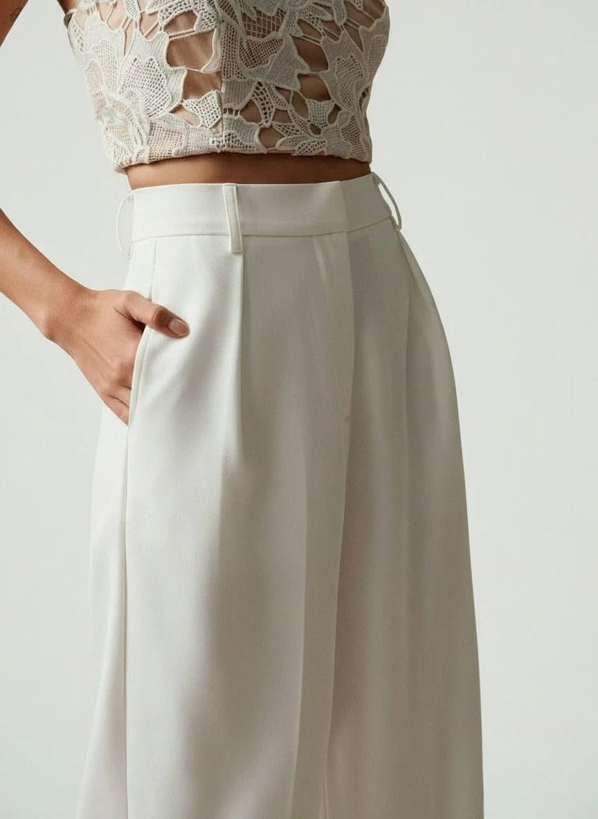 Women's tailored high waist trousers in camel featuring wide leg silhouette and sharp front creases