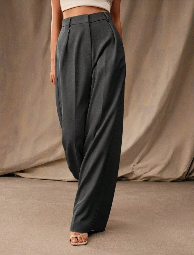 Camel high waist wide leg trousers with sharp front creases and relaxed fit for women