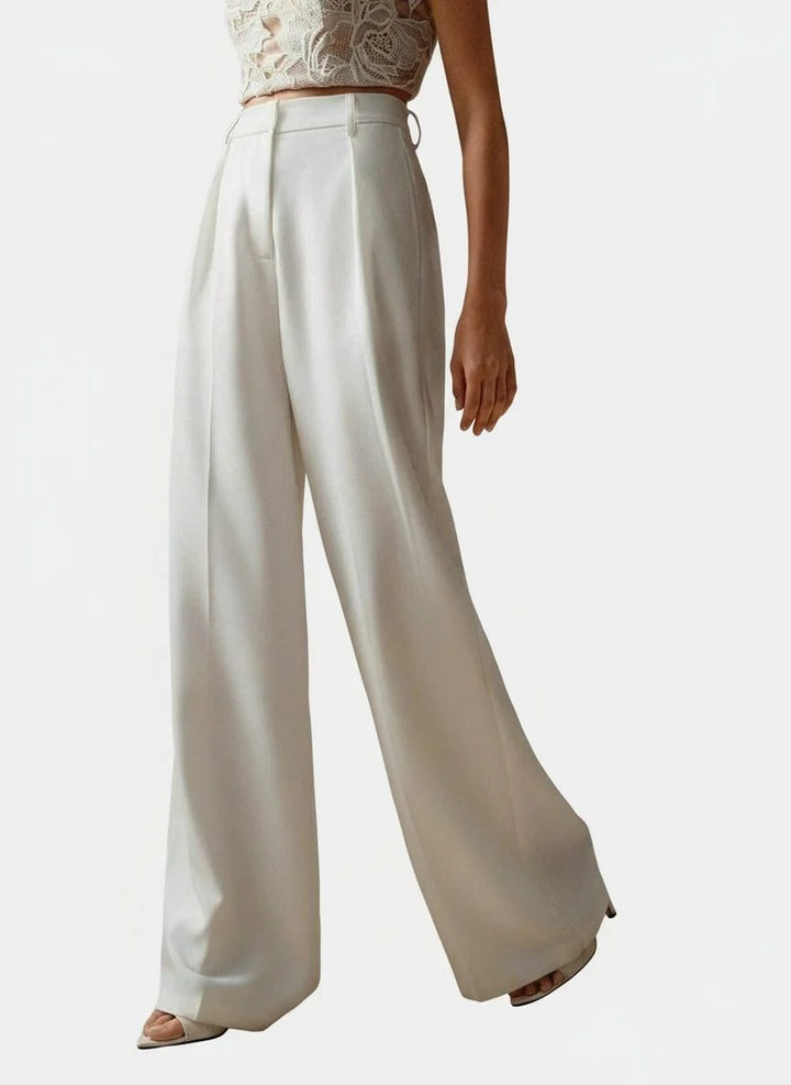 Camel women's high waist trousers with wide leg design and clean vertical lines for versatile styling