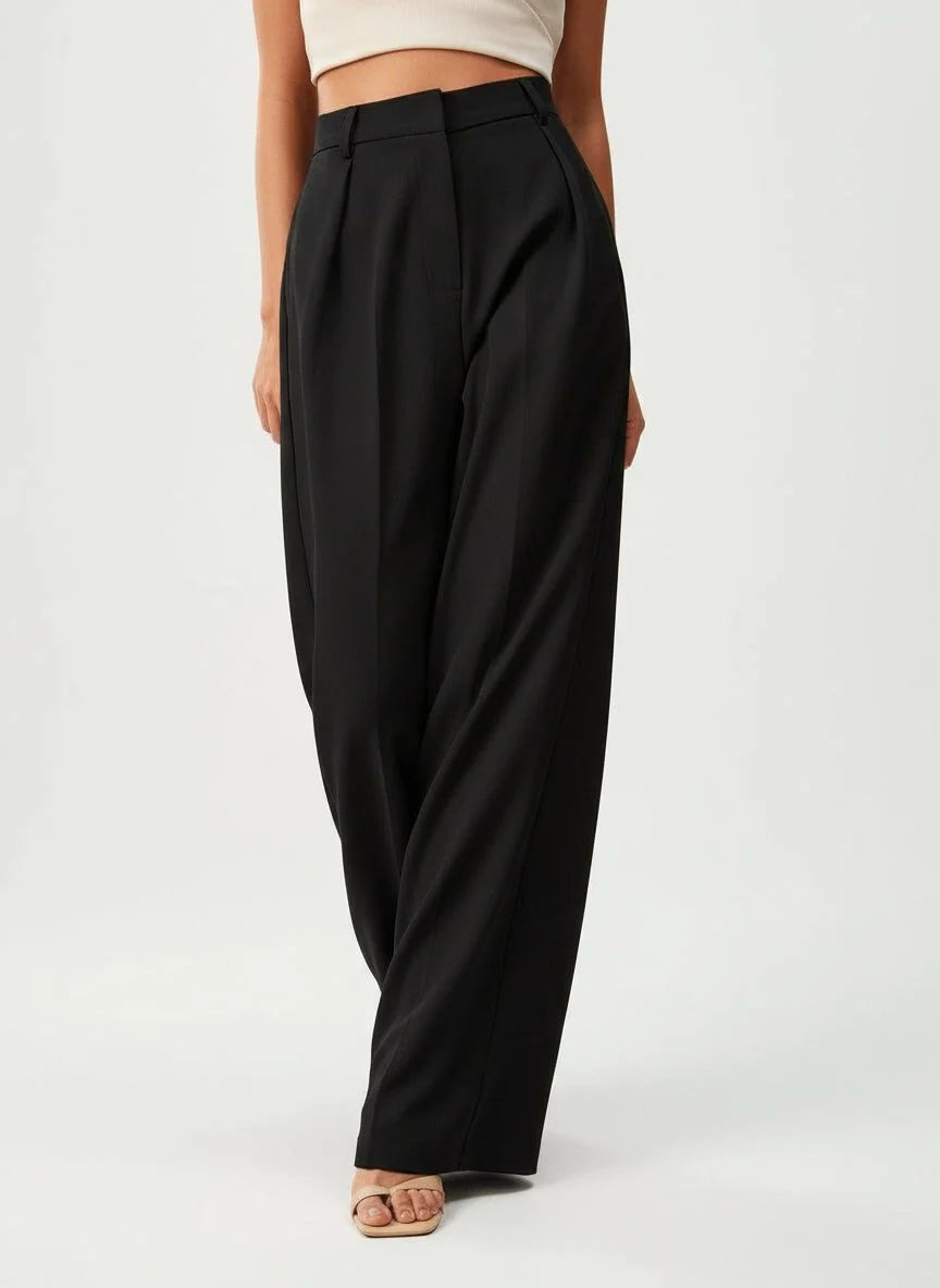 Camel high waist wide leg trousers with structured silhouette and sharp creases for women's workwear