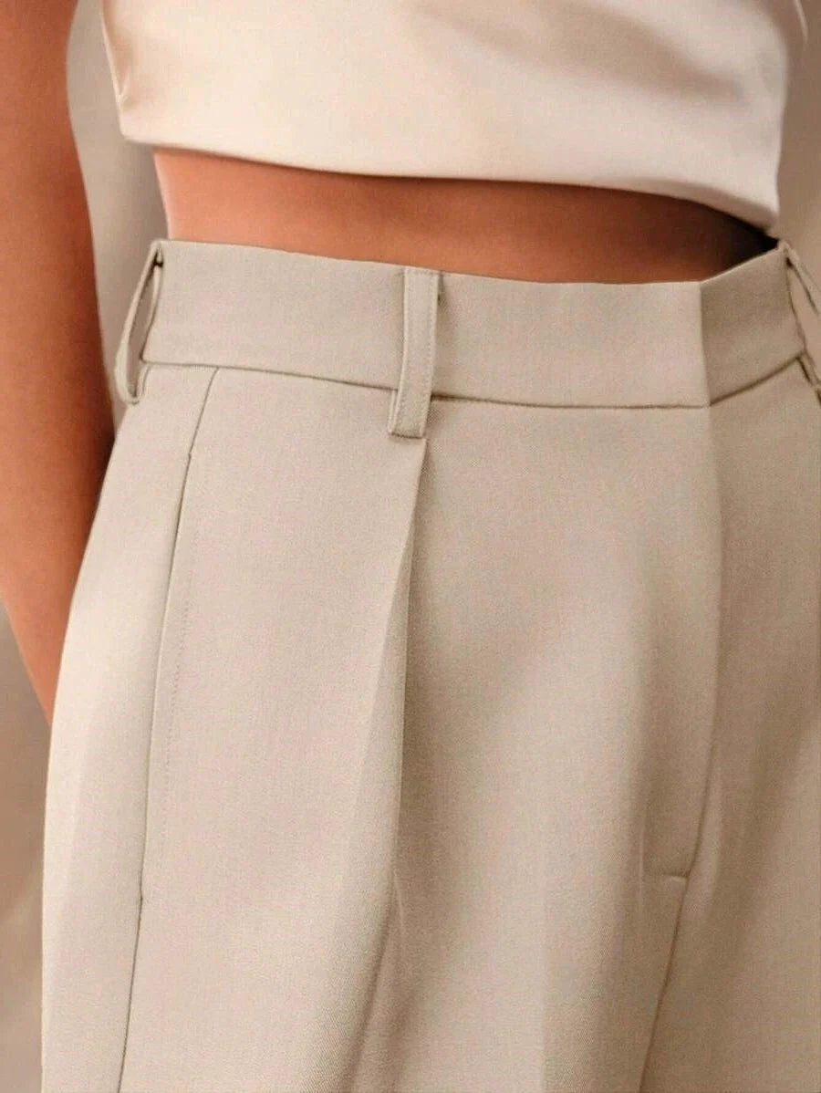 Camel tailored trousers for women featuring high waist and wide leg cut with smooth drape