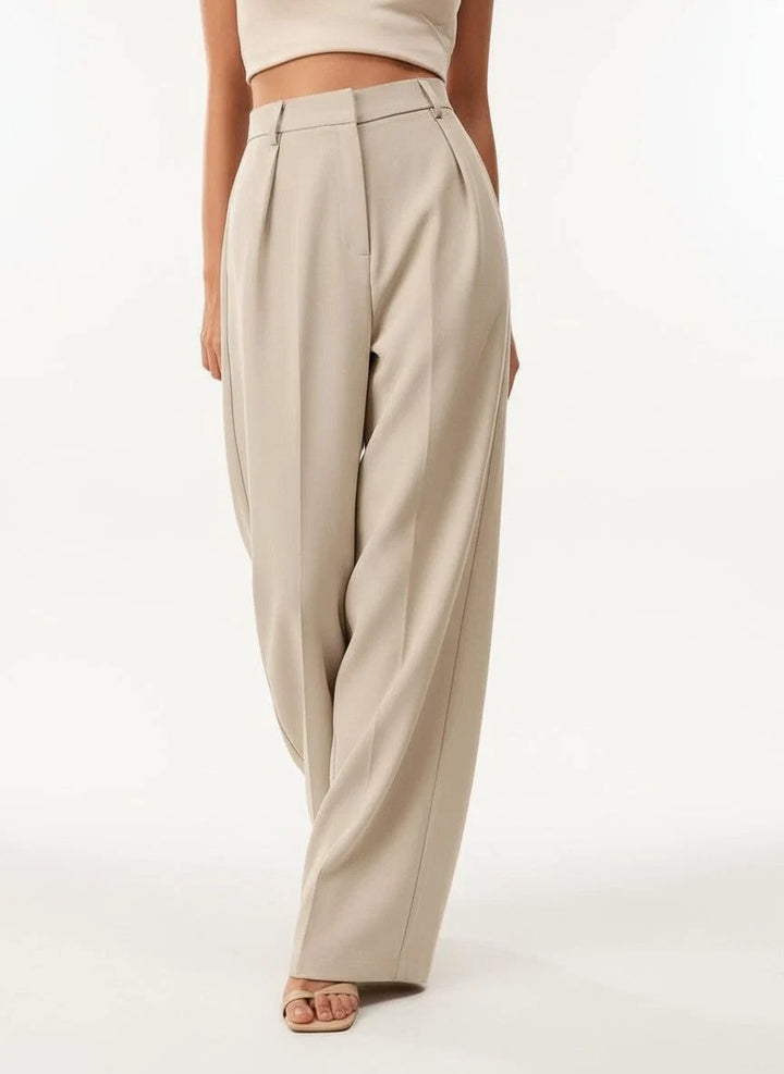 Women's high waist wide leg trousers in camel with clean vertical lines and tailored finish