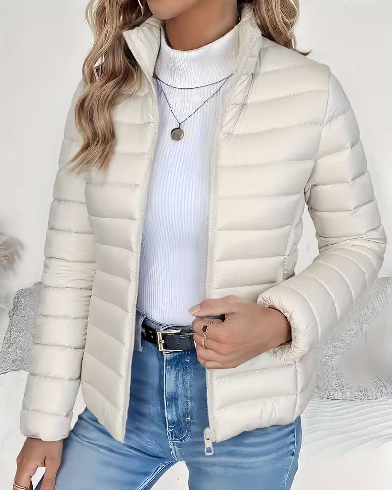 Quilted puffer jacket in light green with structured horizontal quilting and streamlined fit for everyday wear
