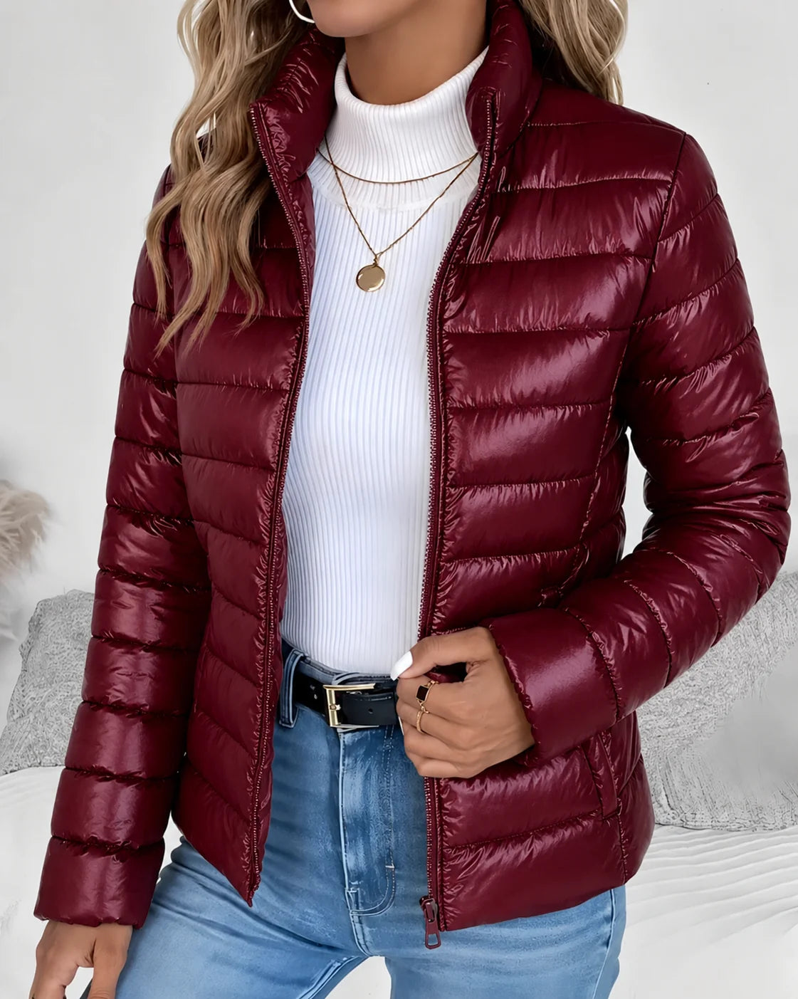 Fitted quilted puffer jacket in mint showing cropped hip length and flattering tailored shape for cold weather