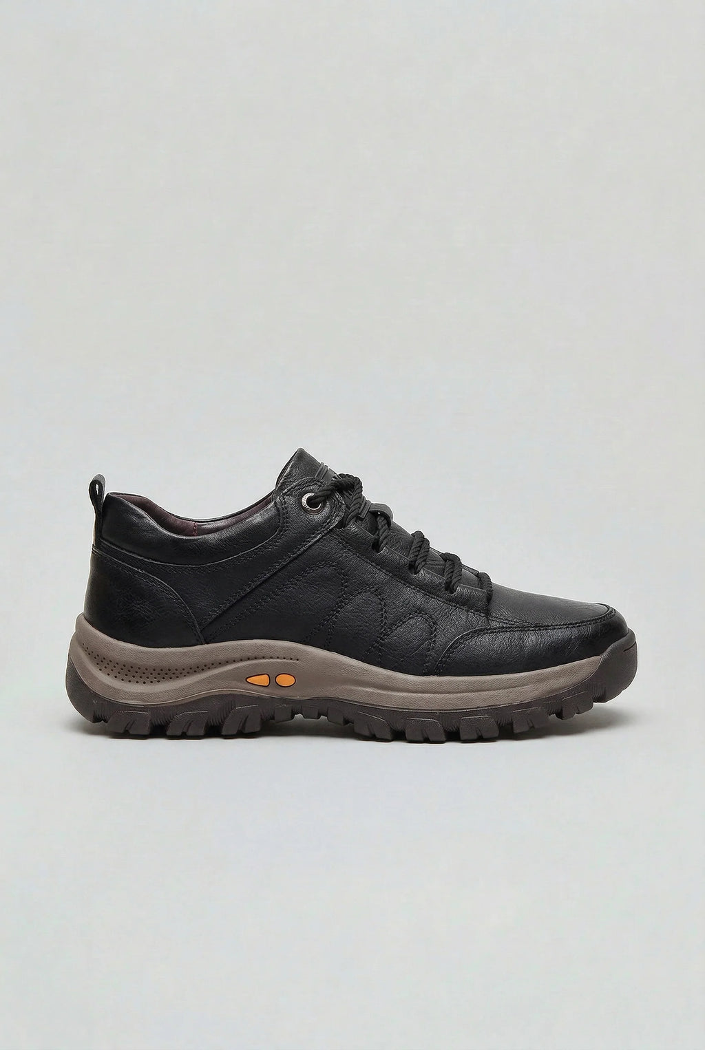 Men's cushioned walking shoes in black with chunky outsole and lace-up closure on neutral background