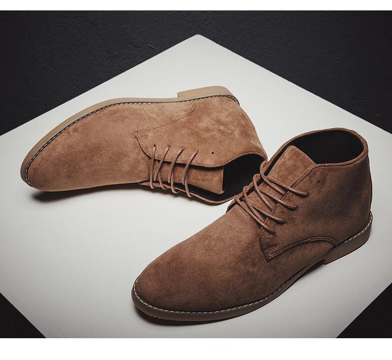 Full view of men's desert boots with pointed toe and ankle-height silhouette