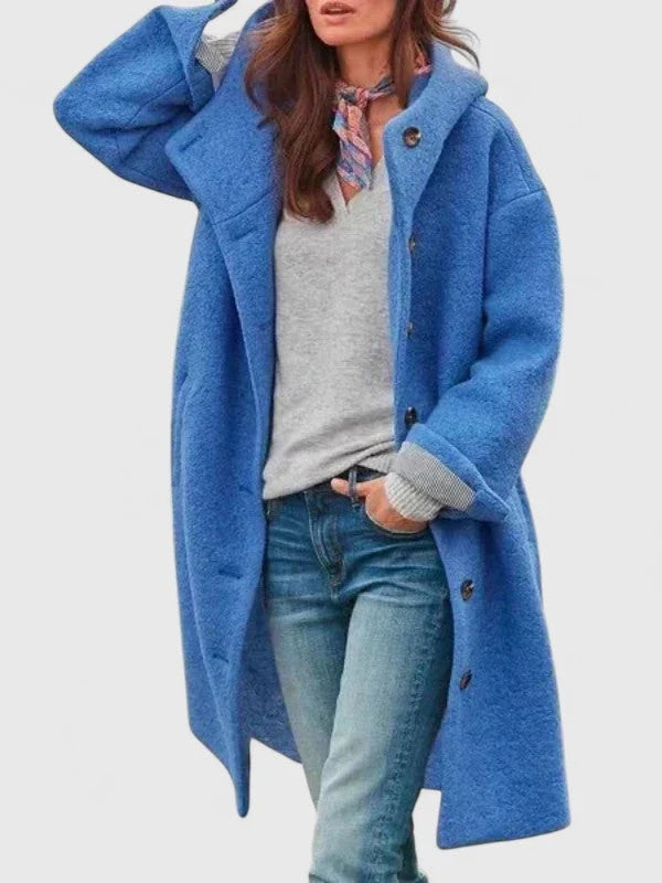 Back view of women's pink bouclé coat with hood and relaxed tailoring