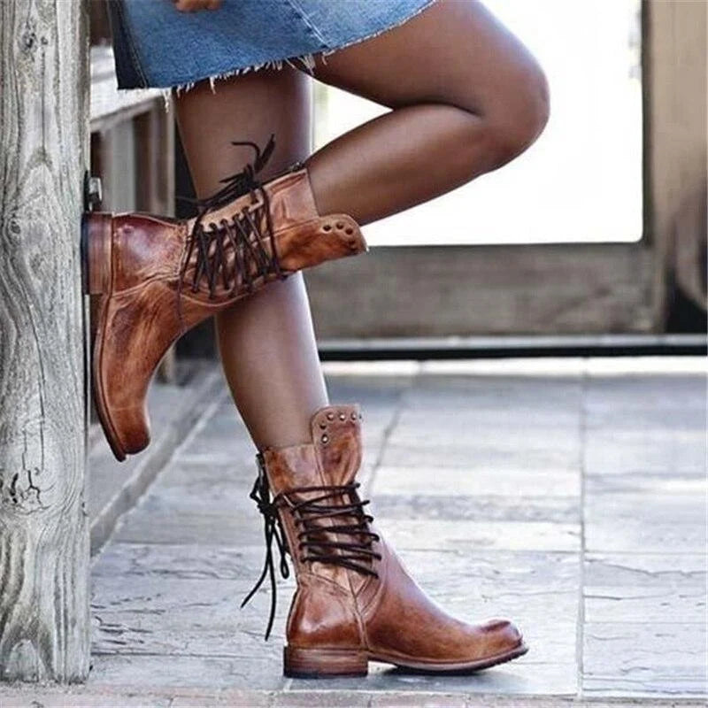 Women's lace-up ankle boots styled with casual outfit showing versatile silhouette