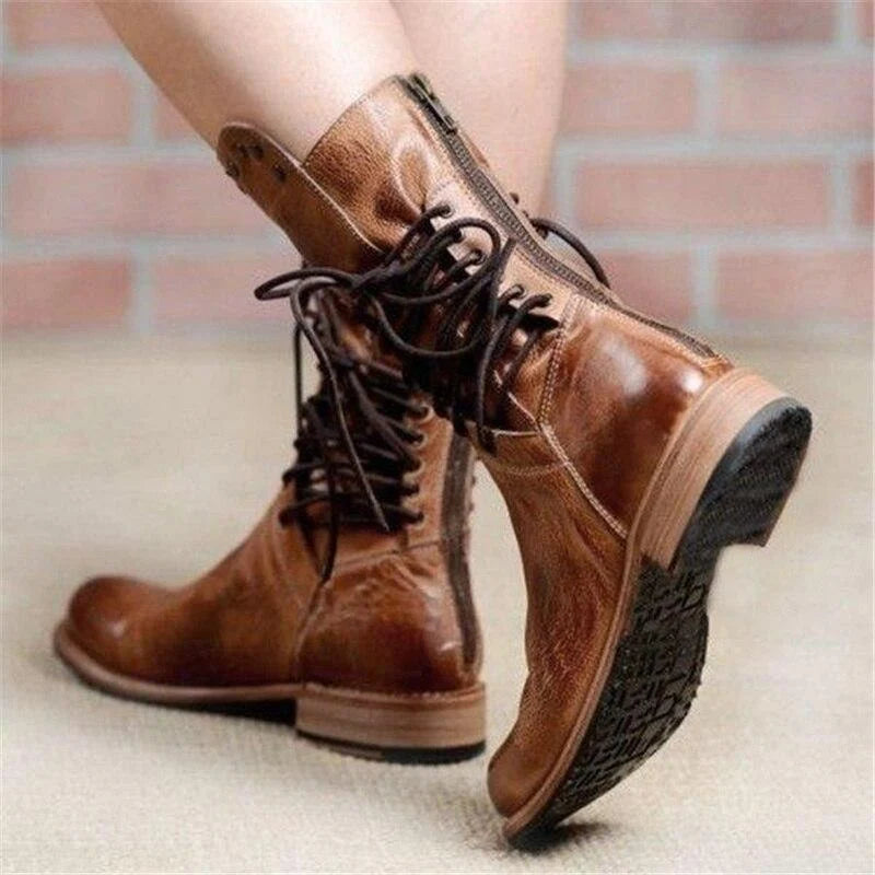 Back view of grey ankle boots with stacked block heel and lace-up design