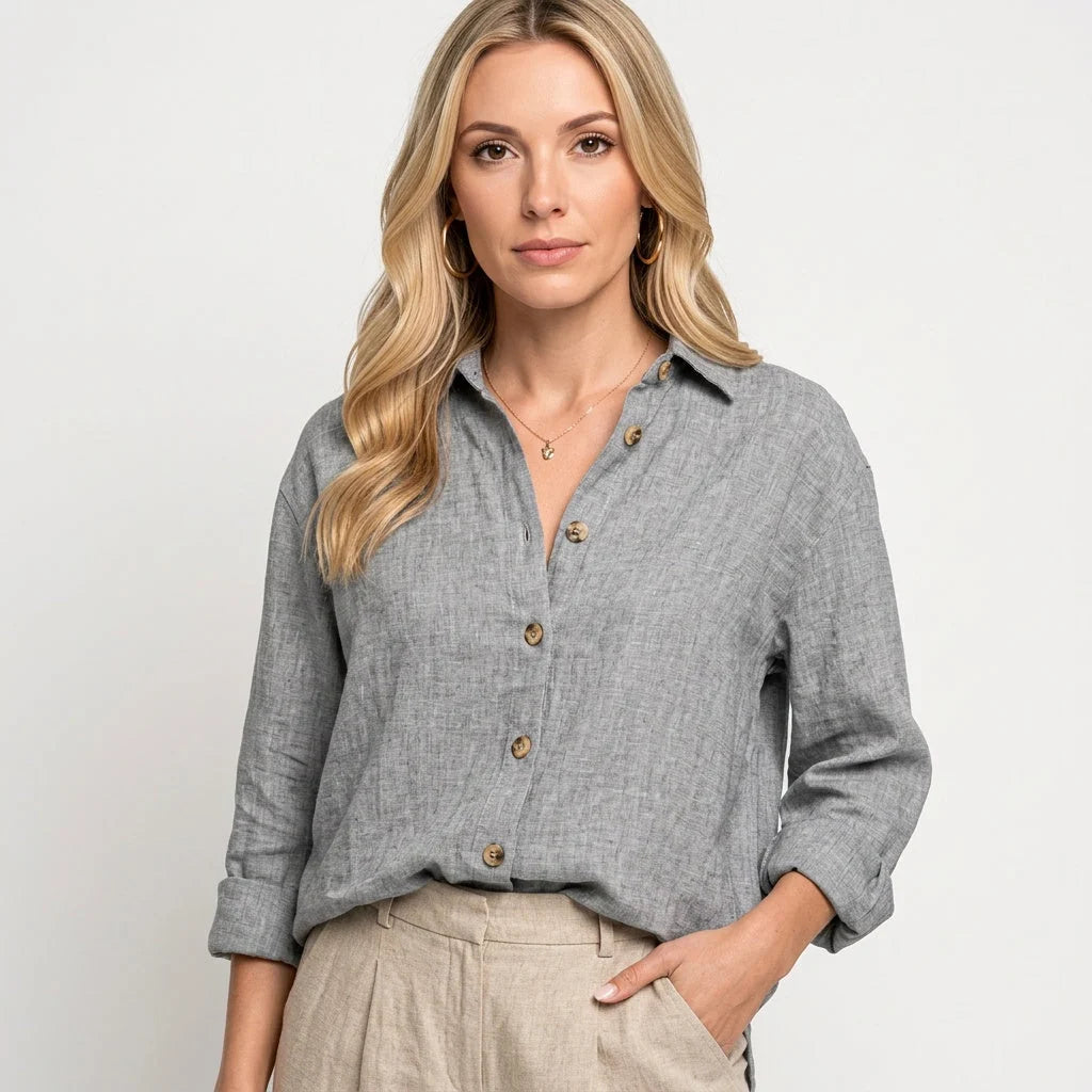 Side view of women's relaxed linen shirt displaying hip-length cut and comfortable fit through the body