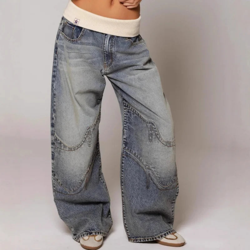 Full-length view of relaxed baggy jeans paired with neutral tones showcasing effortless casual styling