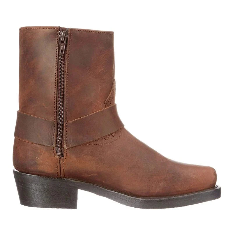 Close-up of studded harness strap detail on men's brown boots