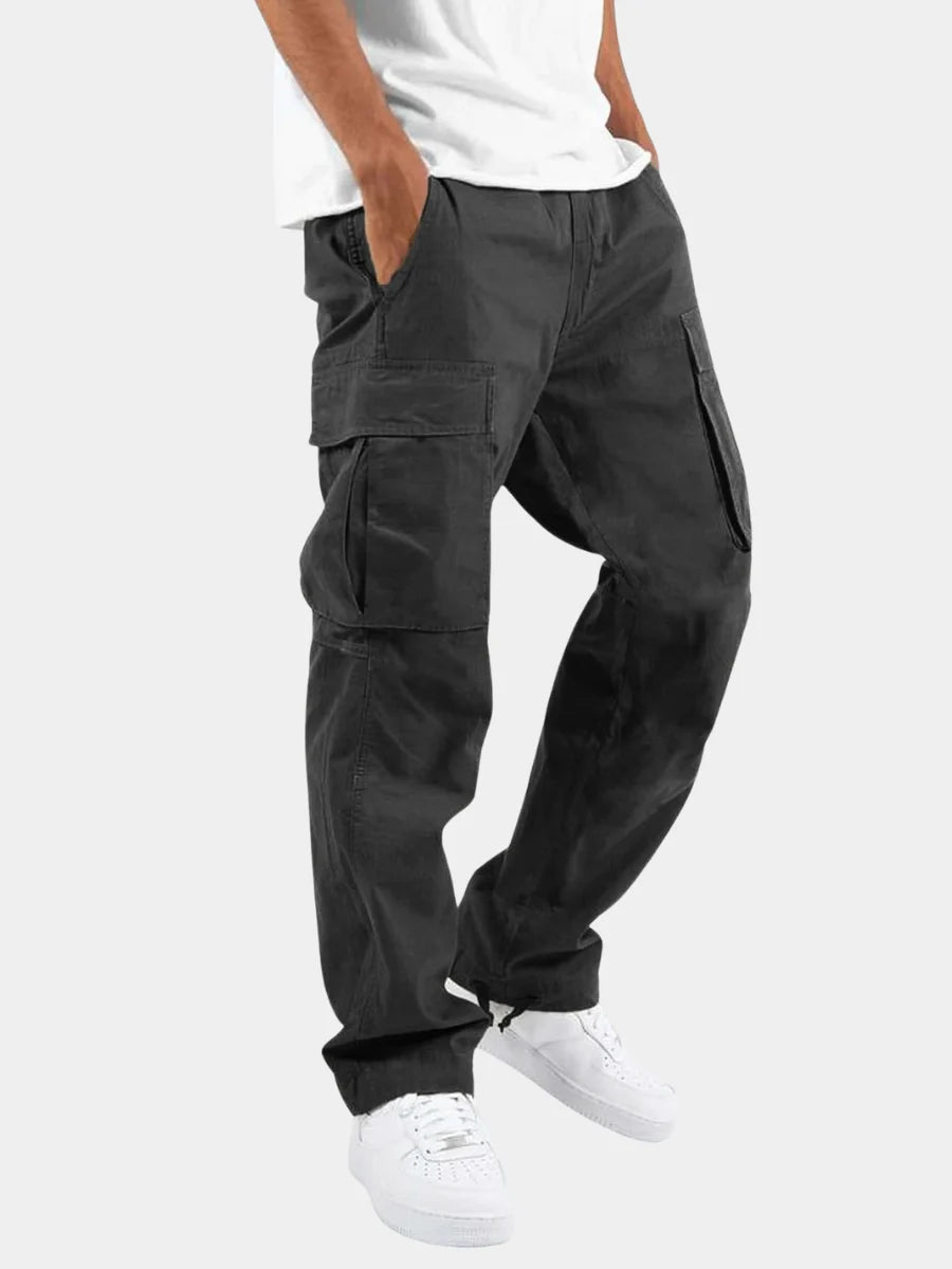 Men's relaxed cargo trousers in charcoal grey with flap pockets and wider leg silhouette