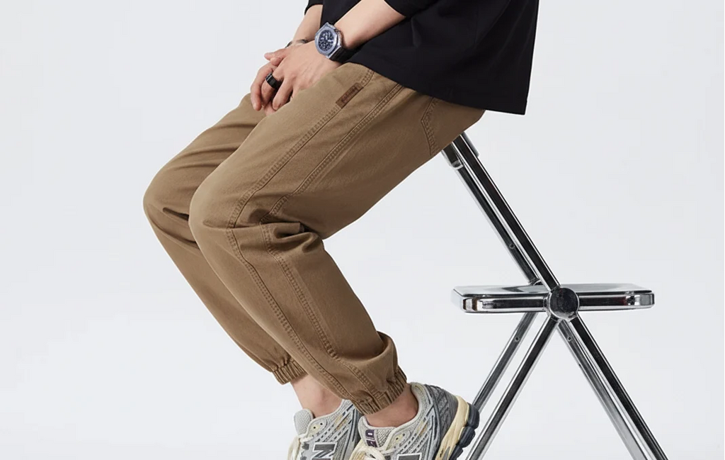 Side view of men's relaxed joggers showing comfortable fit and elasticated waistband detail