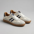 Men's retro trainers with cream suede overlays and navy stripes on gum sole