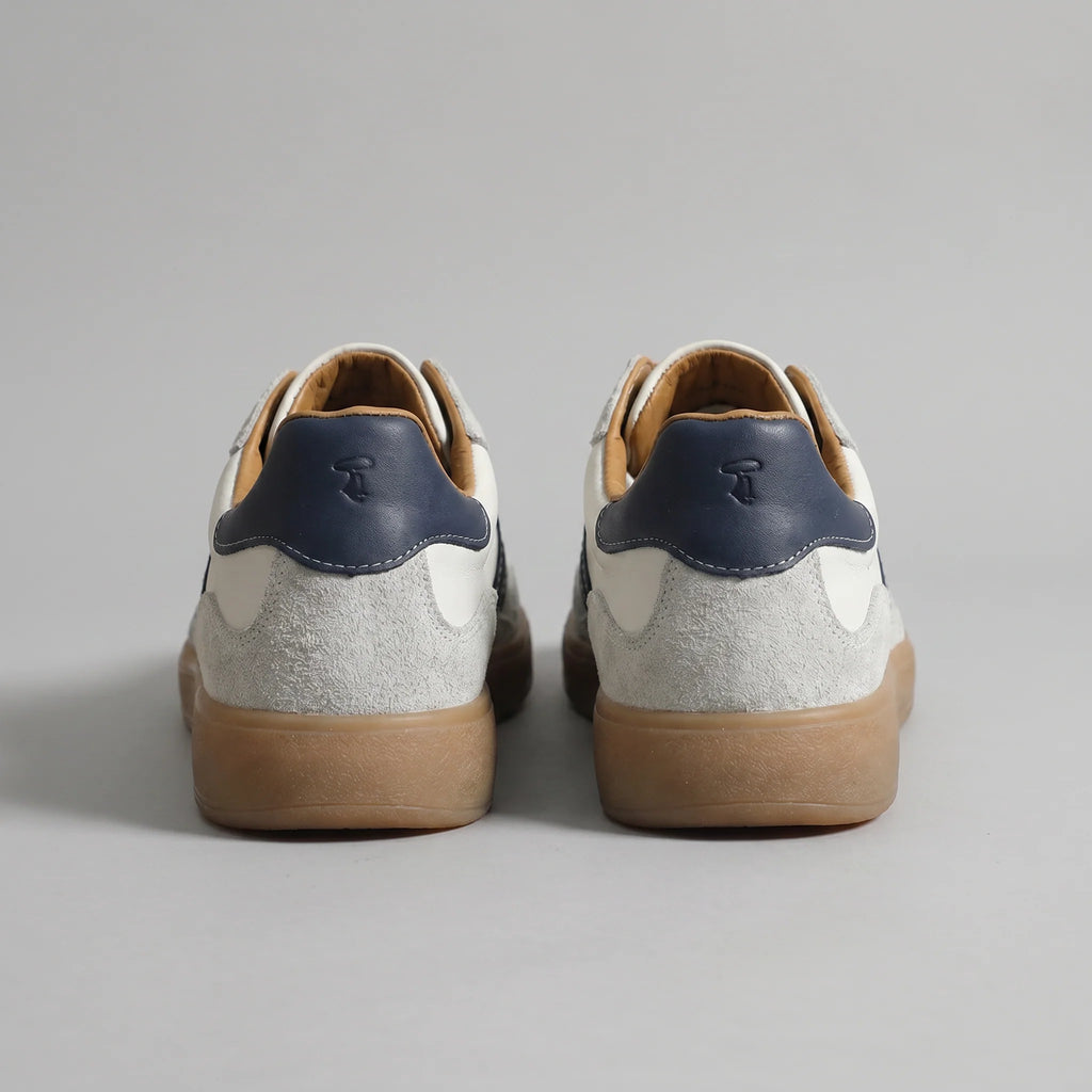 Front angled view of men's lace-up retro trainers with suede overlays