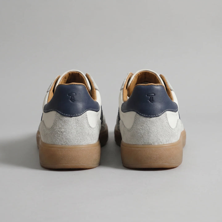 Front angled view of men's lace-up retro trainers with suede overlays