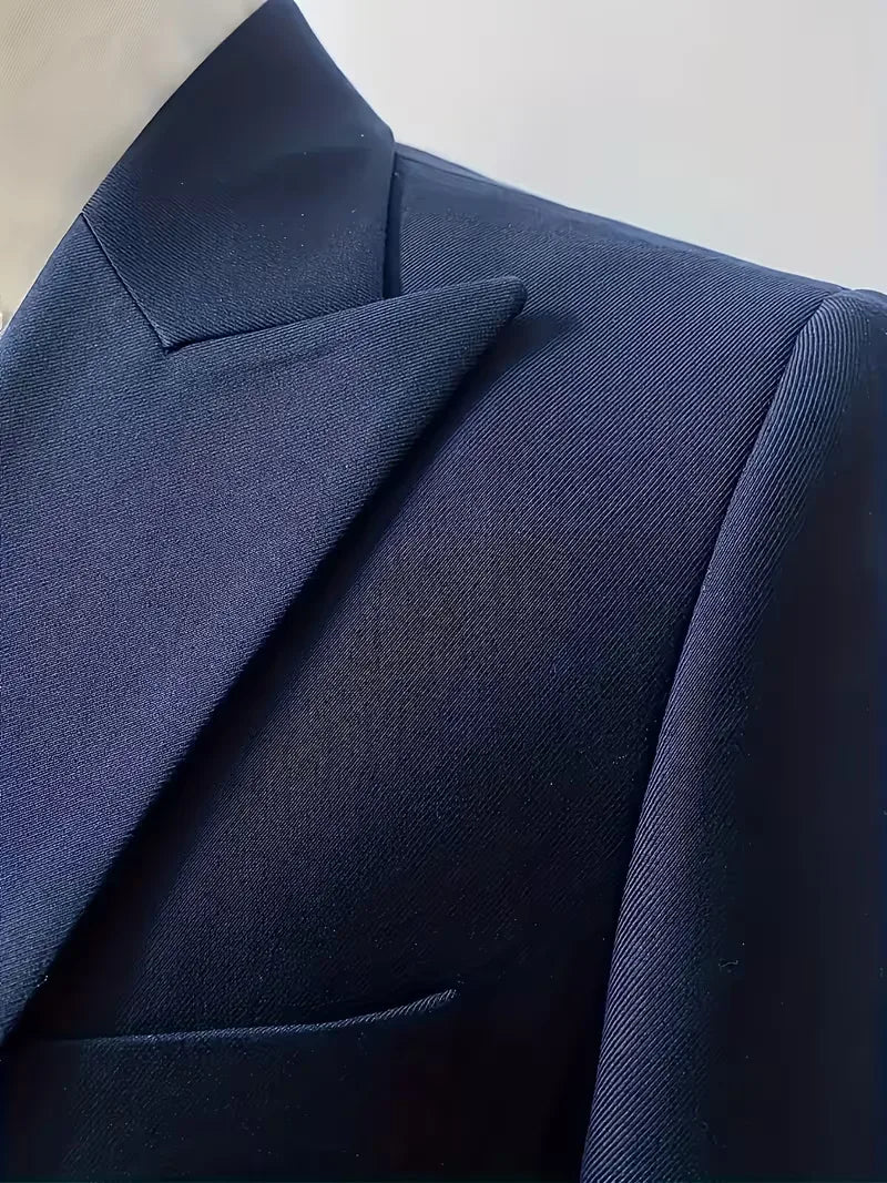 Full view of black three-piece suit set with double-breasted waistcoat centrepiece