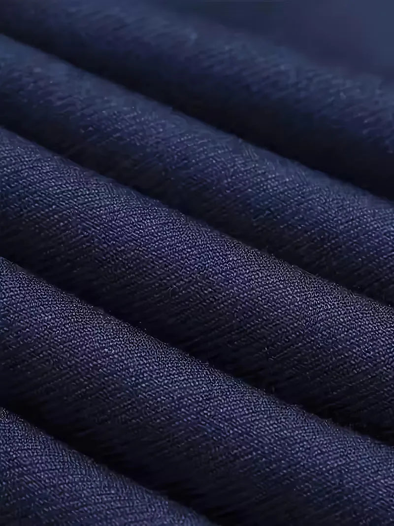 Detail of suit fabric texture and smooth woven finish on blazer and waistcoat